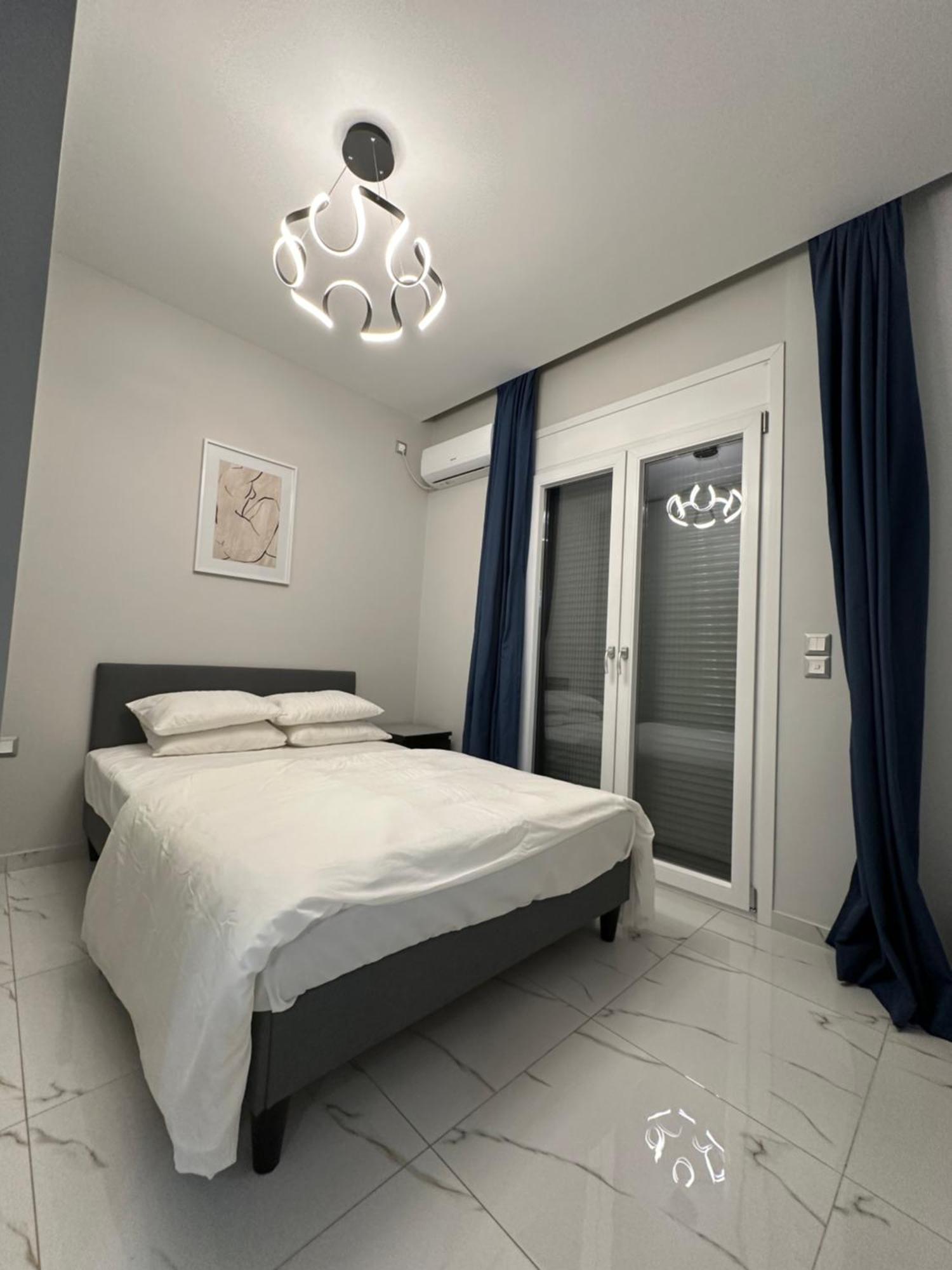Warm And Modern Brand New Apartment Пирей Экстерьер фото